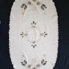 Hímzett drapp riselt nagyfutó ovál 110x50 cm